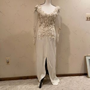 Formal gown knit with very beautiful trim.  Custom couture gown